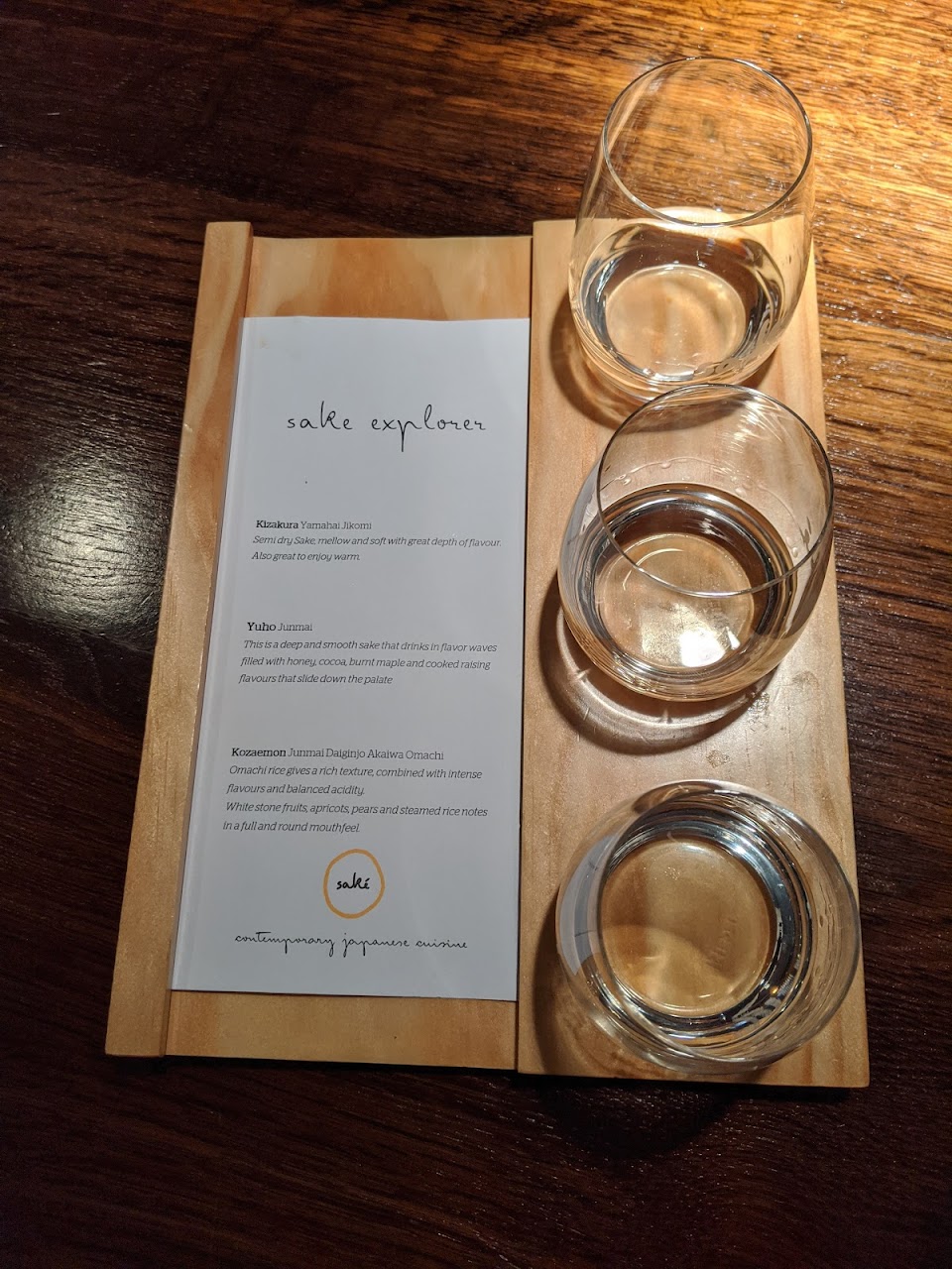 Sake tasting flight and menu at Saké Restaurant & Bar
